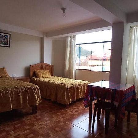 Hospedaje Santa Cruz II Сикуани Экстерьер фото